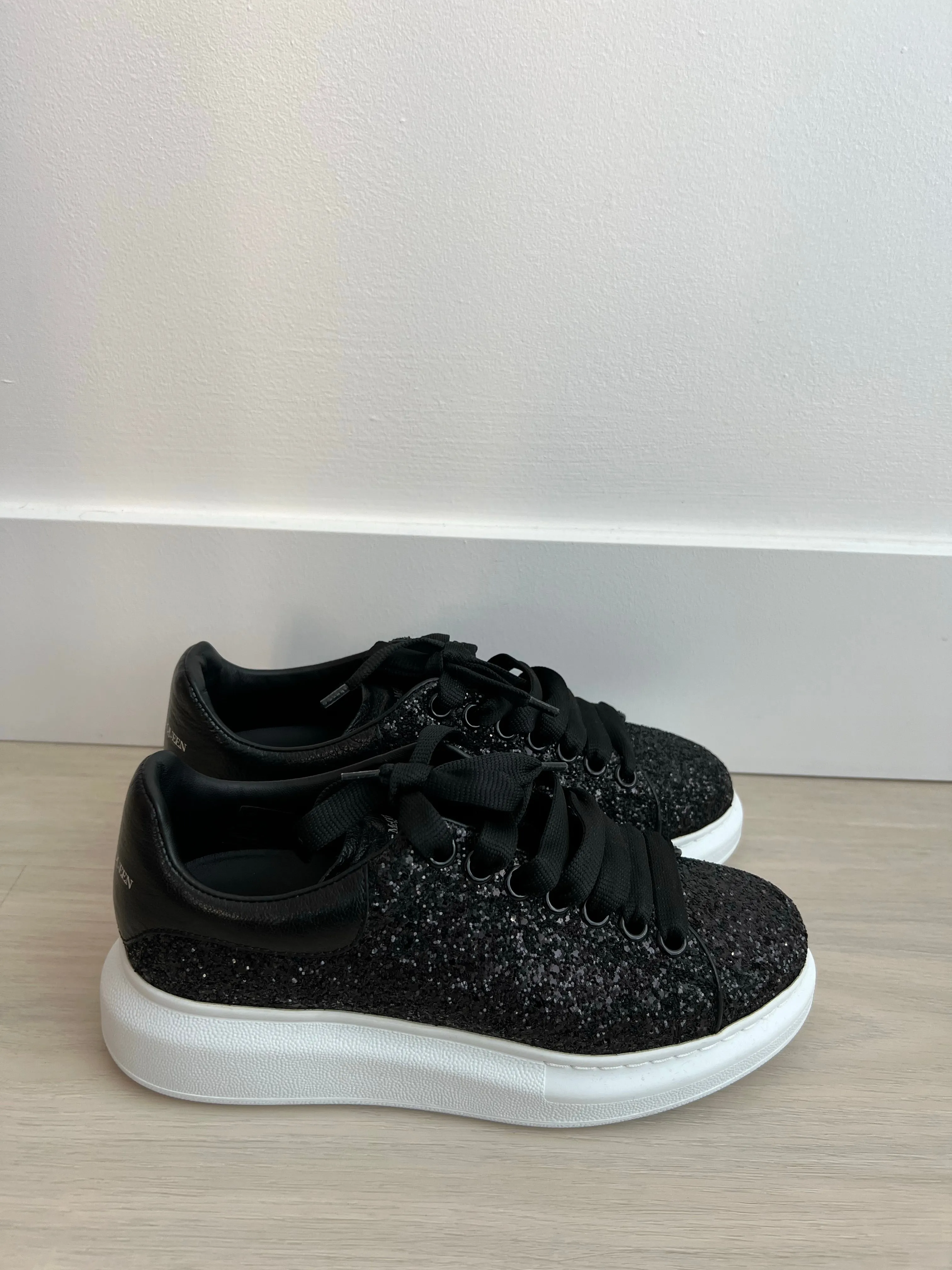 Alexander McQueen Glitter Sneakers can be rewritten as Sparkling Alexander McQueen Sneakers