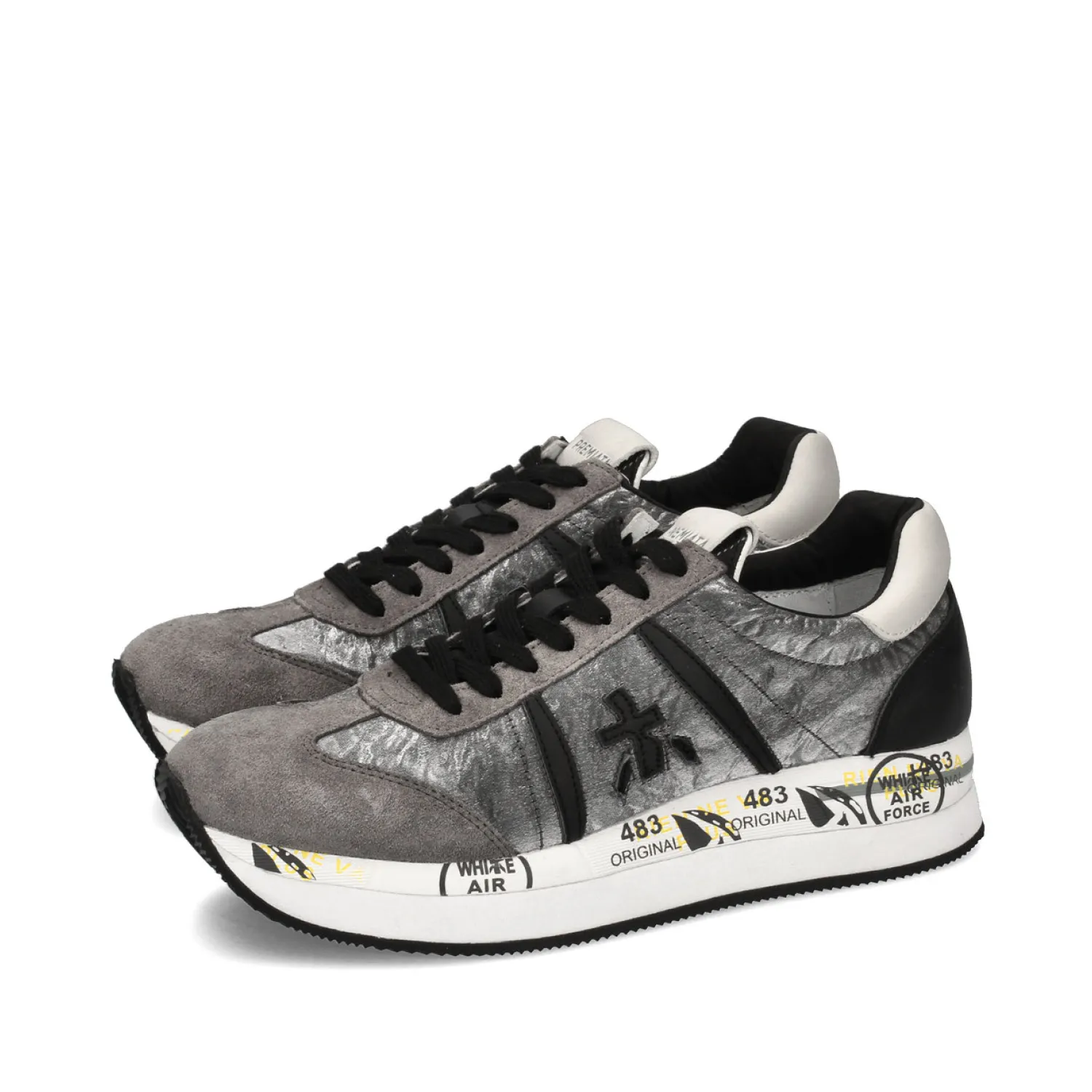 Gray Conny 1493 sneakers.