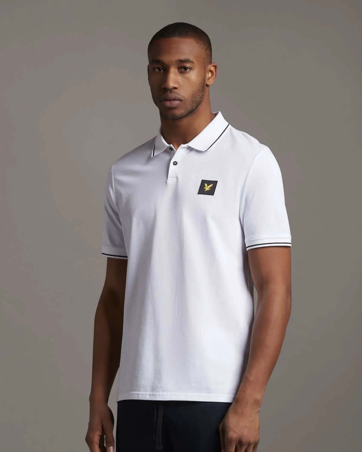 Lyle and Scott white tipped polo shirt for casual wear.