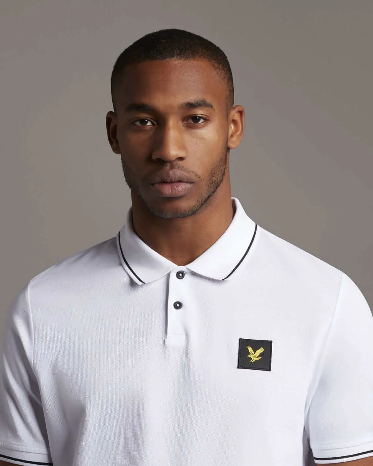 Lyle and Scott white tipped polo shirt for casual wear.