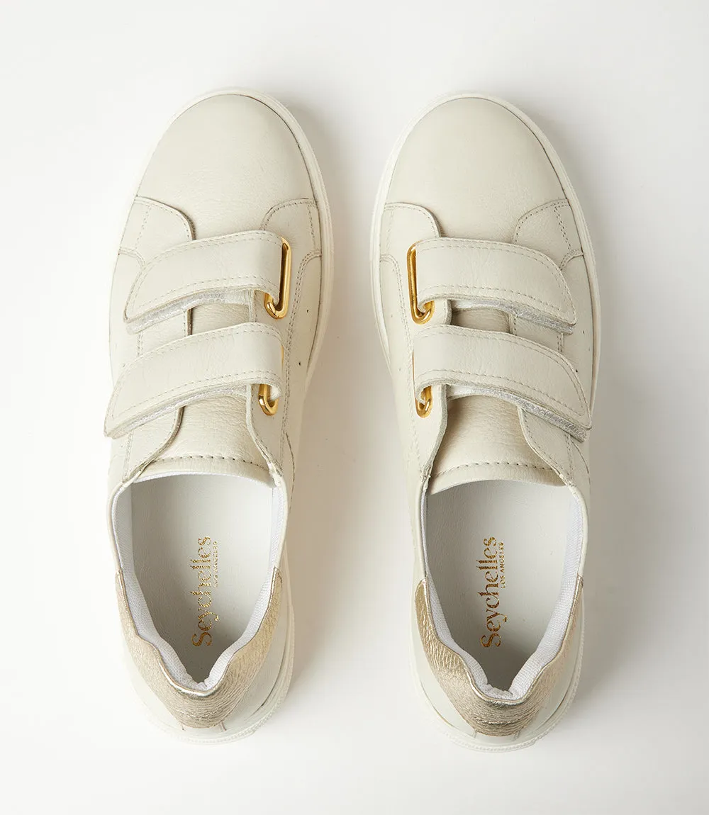 Platform sneakers with Velcro straps.