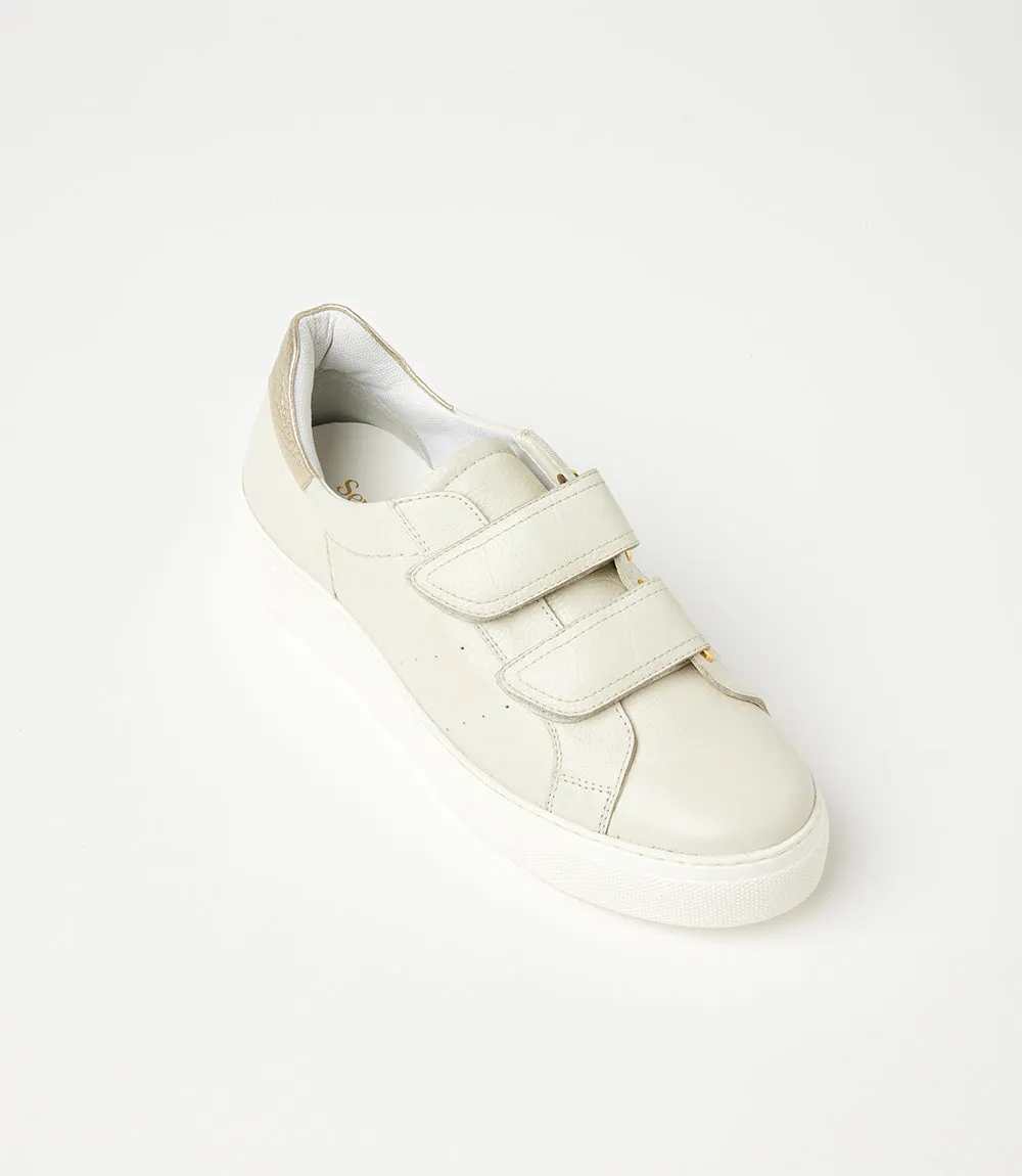 Platform sneakers with Velcro straps.