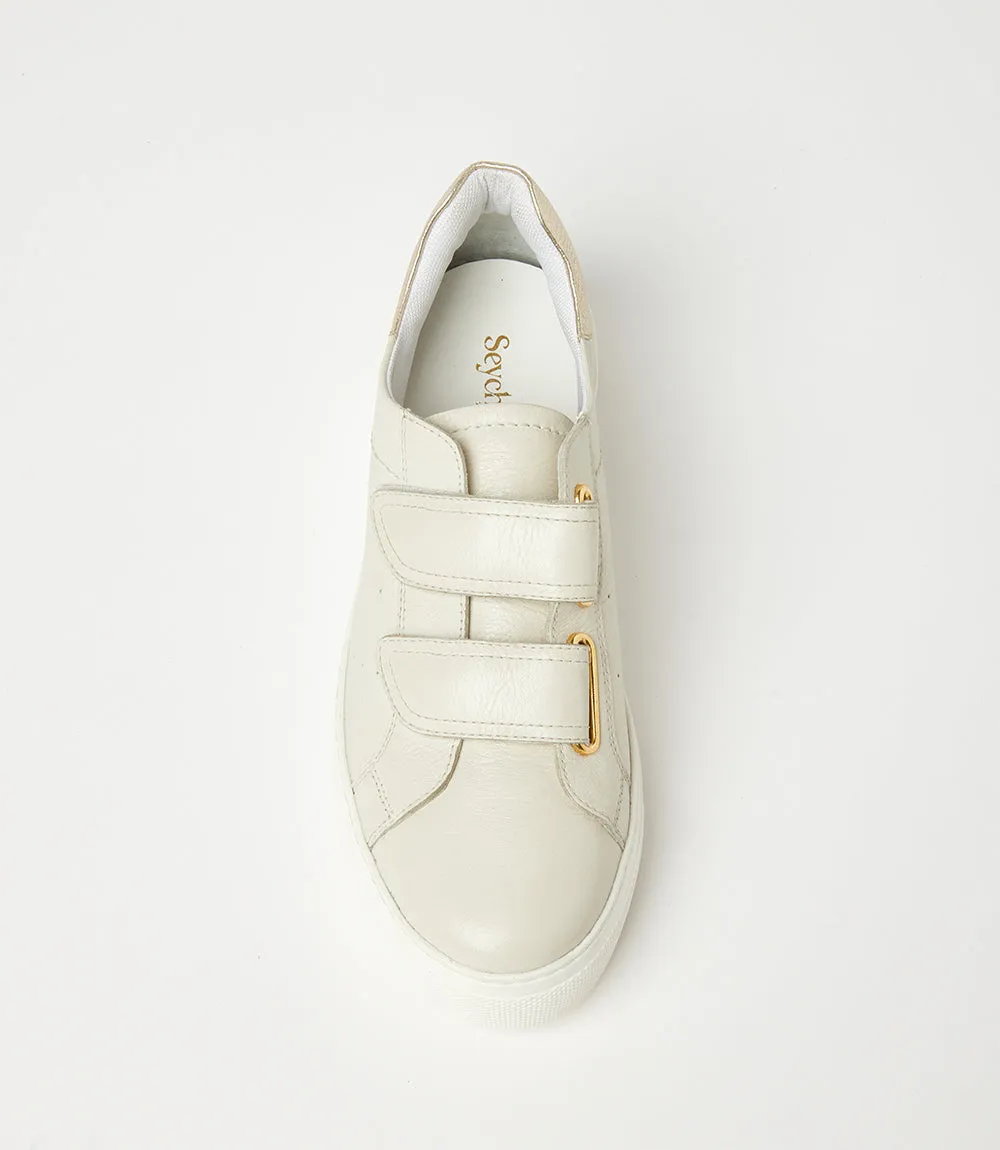 Platform sneakers with Velcro straps.