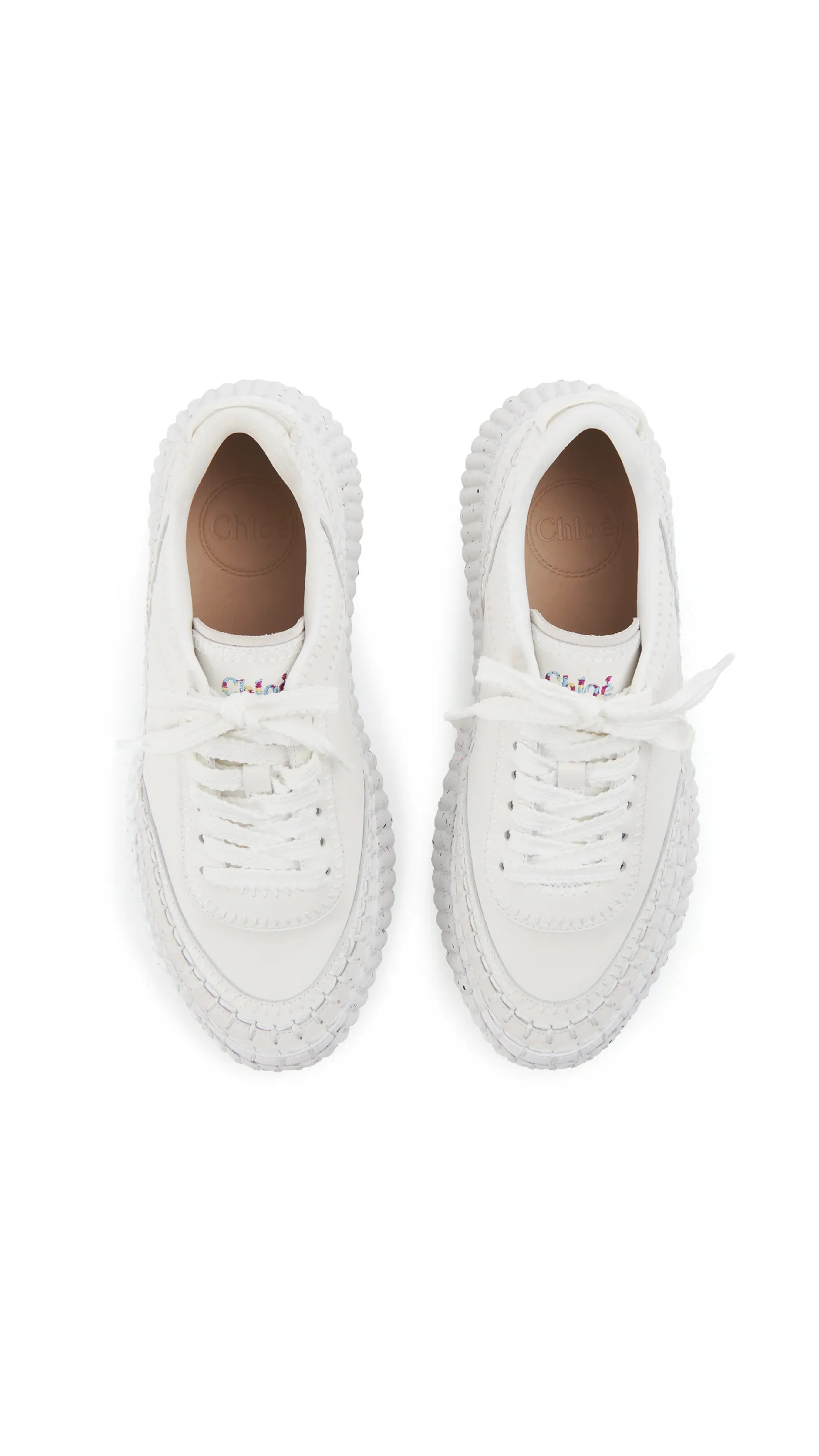 The result is: Sleek White Nama Sneakers.