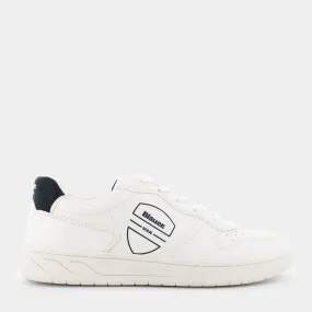 White spike navy sneakers.